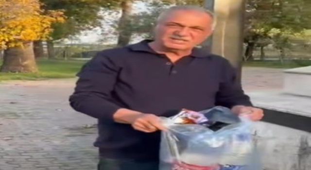 Şehitliğe saygısızlık yapanlara tepki gösterdi, çöpleri tek tek topladı